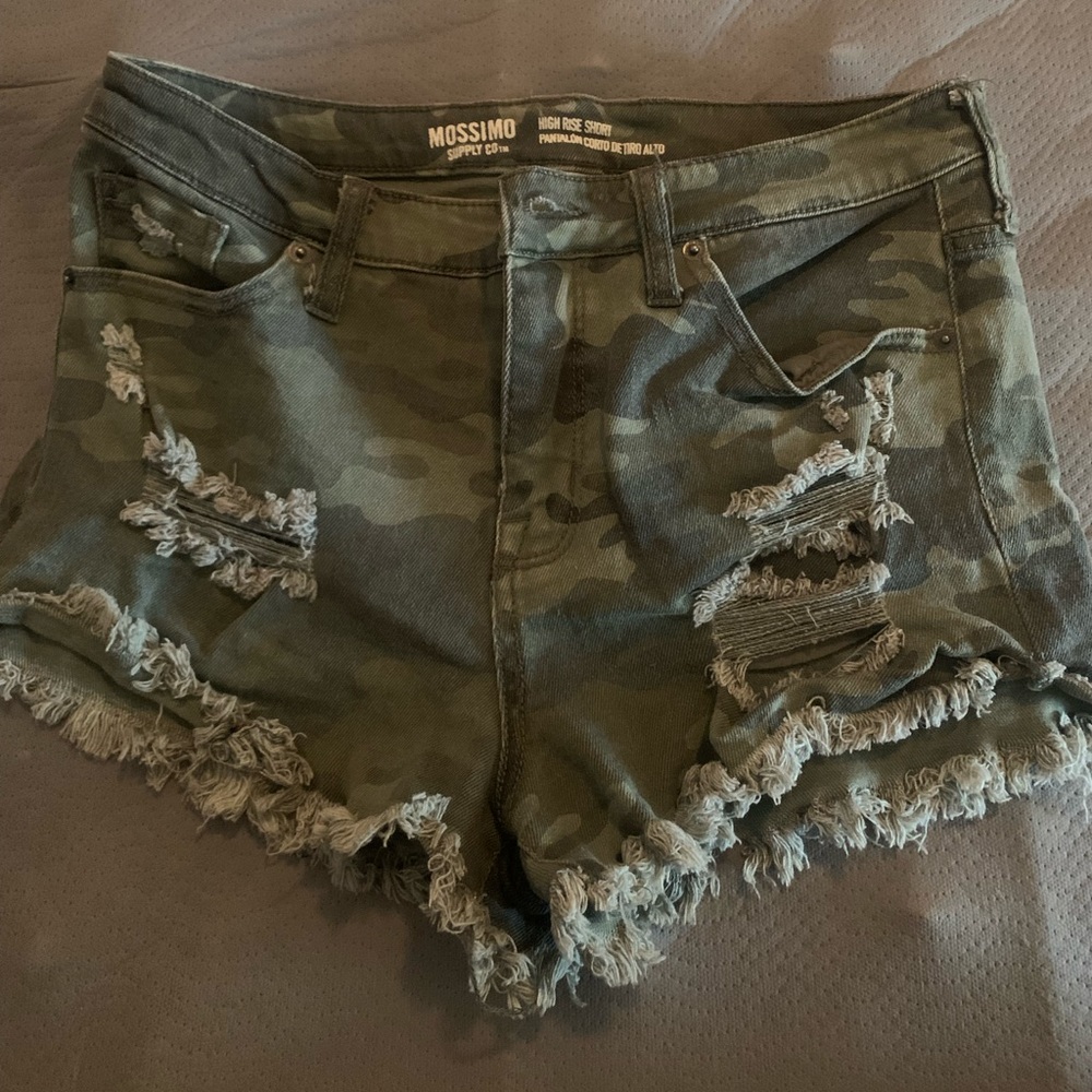 Camo distressed shorts.